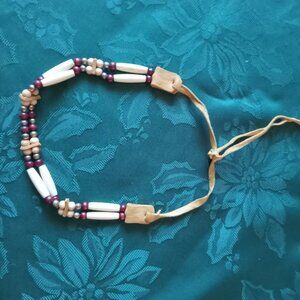 Bone and beaded choker with leather tie, in great condition